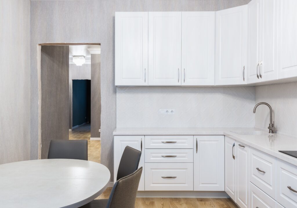 A pristine, all-white break room, showcasing the results of office and commercial cleaning service in Fort Worth