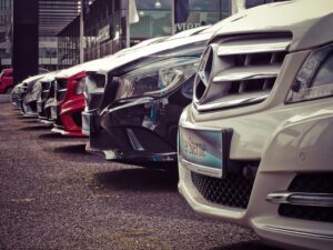 Exterior of a car dealership in Fort Worth, showcasing rows of cleaned and polished vehicles, maintained by Fort Worth Cleaning Professionals.