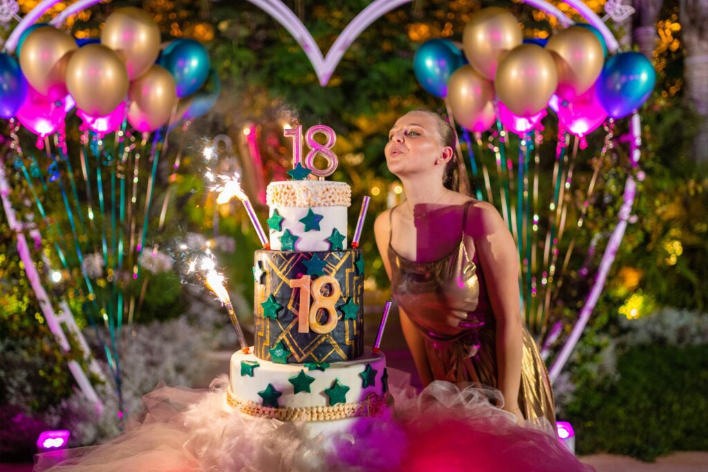 A woman celebrating her 18th birthday in a beautifully cleaned event space, with sparkling floors and spotless tables, thanks to Fort Worth Cleaning Professionals.