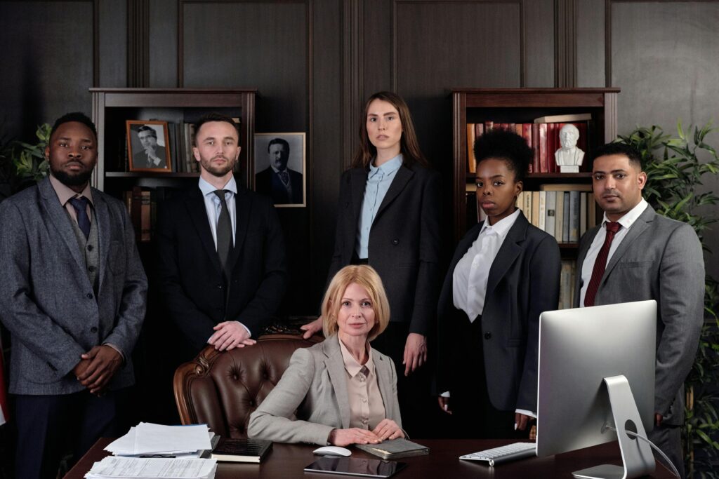 Group of lawyers standing in a spotless, well-organized office cleaned by Fort Worth Cleaning Professionals in Fort Worth, TX.